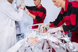 doctor paramedic examining patient emergency room